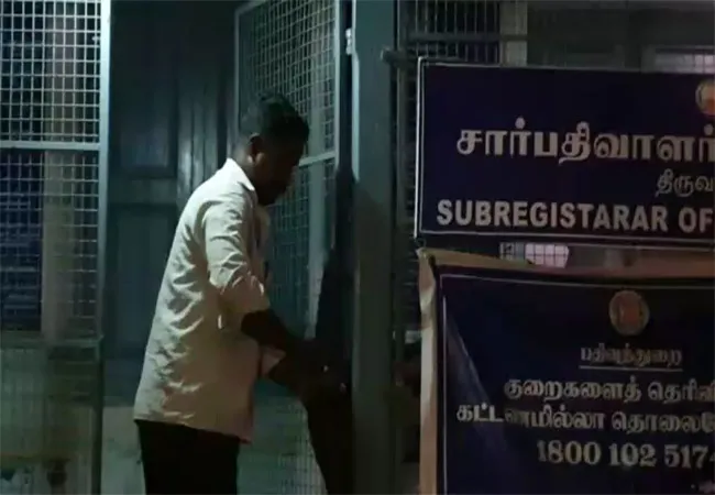 tiruvarur resgistrar officer corruption  department raid 